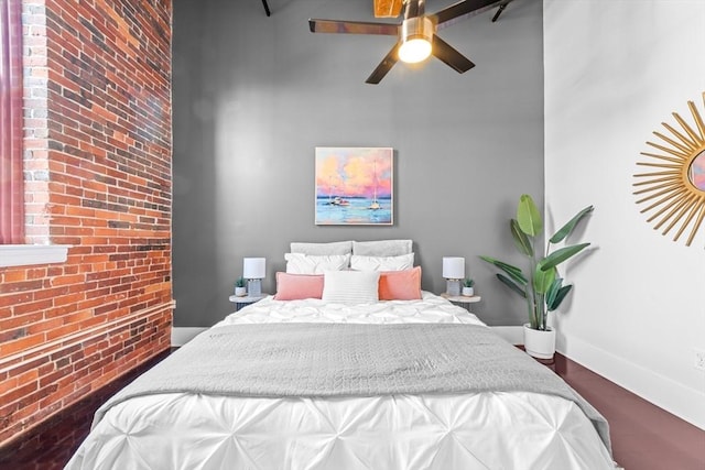 37 Millyard Unit 206, Amesbury, MA 01913 - bedroom featuring a ceiling fan and brick wall