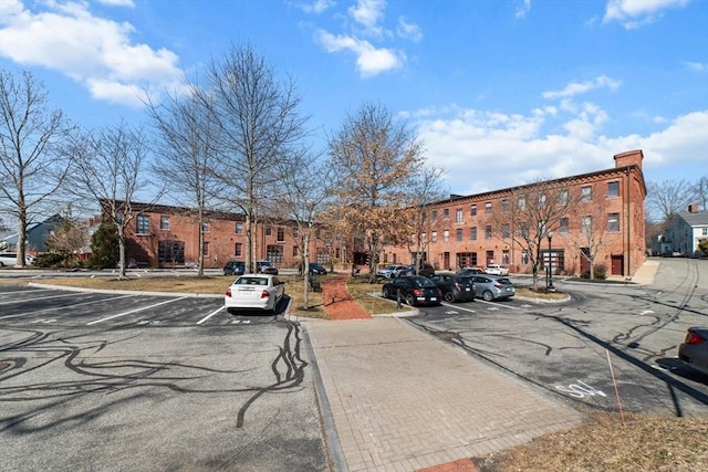 37 Millyard Unit 206, Amesbury, MA 01913 - view of asphalt road featuring curbs and sidewalks