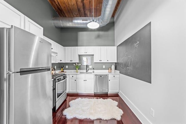 37 Millyard Unit 206, Amesbury, MA 01913 - kitchen with appliances with stainless steel finishes, a sink, wood ceiling, dark wood-type flooring, and a high ceiling