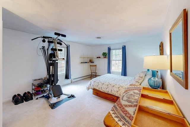 carpeted bedroom with a baseboard radiator