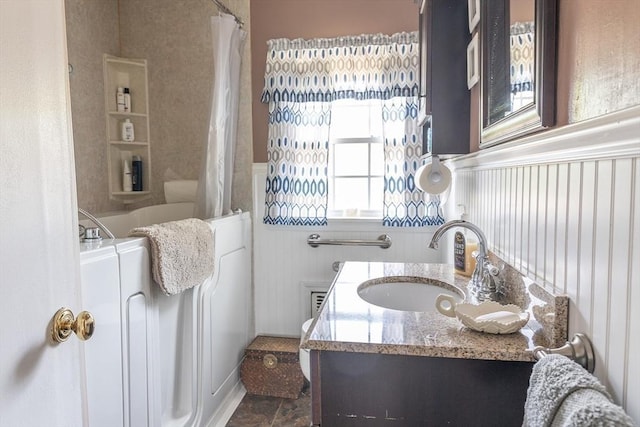 224 Palmer Rd, Monson, MA 01057 - bathroom featuring vanity, a shower with curtain, separate washer and dryer, and a wainscoted wall