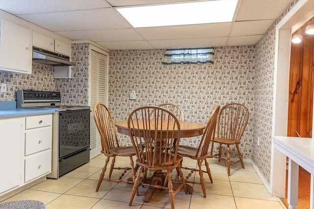 224 Palmer Rd, Monson, MA 01057 - dining room with a drop ceiling and light tile patterned floors