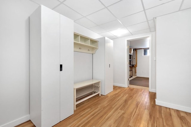 mudroom with hardwood / wood-style flooring and a paneled ceiling