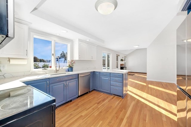 kitchen with dishwasher, light wood-type flooring, black range with electric cooktop, white cabinetry, and blue cabinets