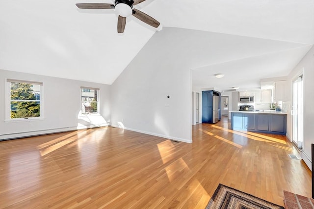 unfurnished living room with lofted ceiling, baseboard heating, ceiling fan, and light hardwood / wood-style floors