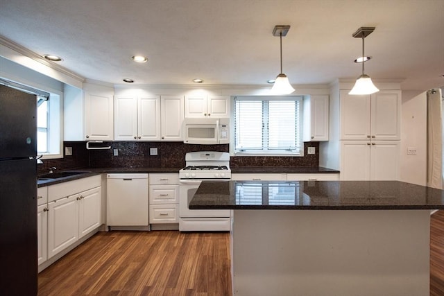 30 Partridge Ave, Somerville, MA 02145 - kitchen with white appliances, dark wood-type flooring, white cabinetry, and recessed lighting