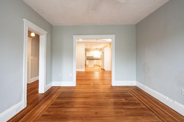 30 Partridge Ave, Somerville, MA 02145 - spare room with a ceiling fan, wood finished floors, and baseboards