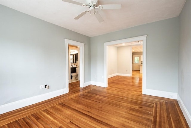 30 Partridge Ave, Somerville, MA 02145 - unfurnished room with baseboards, a ceiling fan, and wood finished floors
