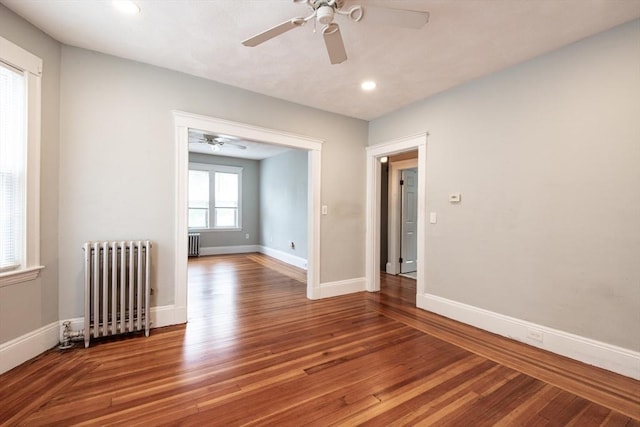 30 Partridge Ave, Somerville, MA 02145 - empty room with radiator, a ceiling fan, baseboards, and recessed lighting
