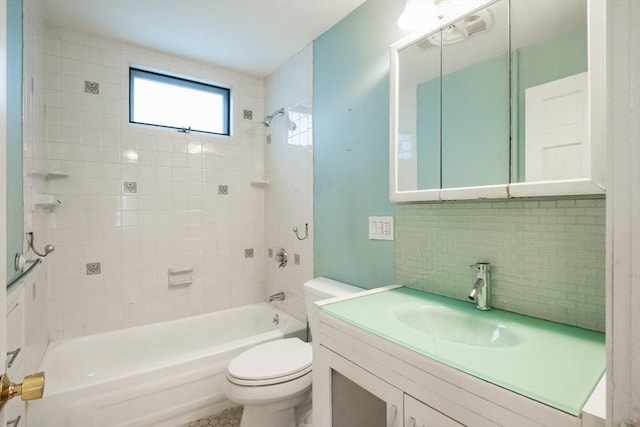 30 Partridge Ave, Somerville, MA 02145 - bathroom featuring vanity, toilet, bathing tub / shower combination, and backsplash