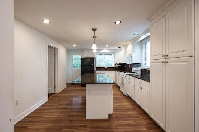 30 Partridge Ave, Somerville, MA 02145 - kitchen featuring white appliances, a sink, dark wood-style floors, white cabinets, and recessed lighting