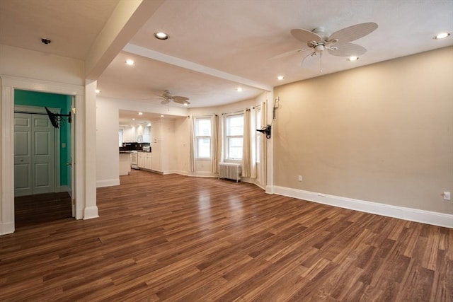 30 Partridge Ave, Somerville, MA 02145 - unfurnished living room featuring radiator, a ceiling fan, baseboards, and recessed lighting