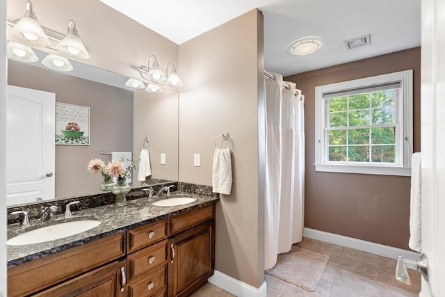 20 Hillside Dr, Georgetown, MA 01833 - bathroom with double vanity and tile patterned floors