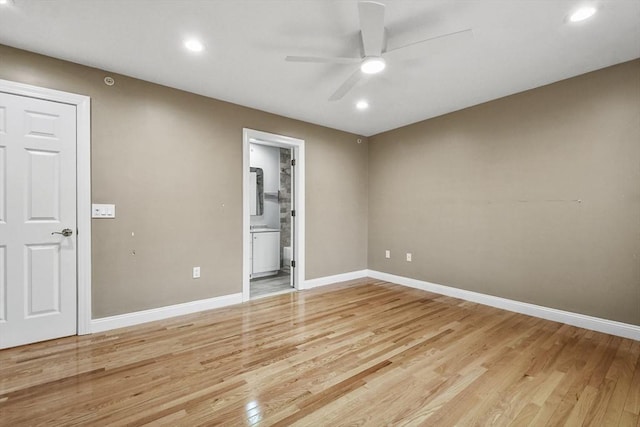 unfurnished room with ceiling fan and light hardwood / wood-style flooring