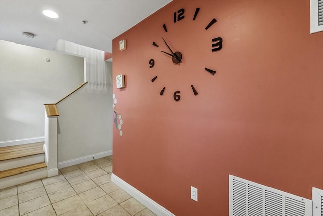 hallway with light tile patterned floors