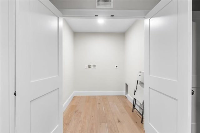 washroom featuring hookup for an electric dryer, laundry area, visible vents, baseboards, and hookup for a washing machine