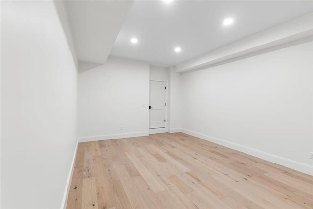 68 Evergreen Unit B, Newton, MA 02466 - basement featuring recessed lighting, baseboards, and light wood-type flooring