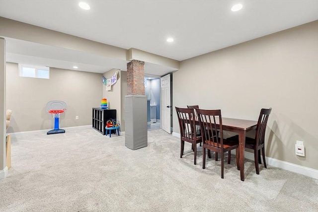 carpeted dining room featuring baseboards and recessed lighting