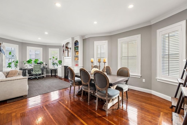 dining space with hardwood / wood-style floors, recessed lighting, ornamental molding, a desk, and baseboards