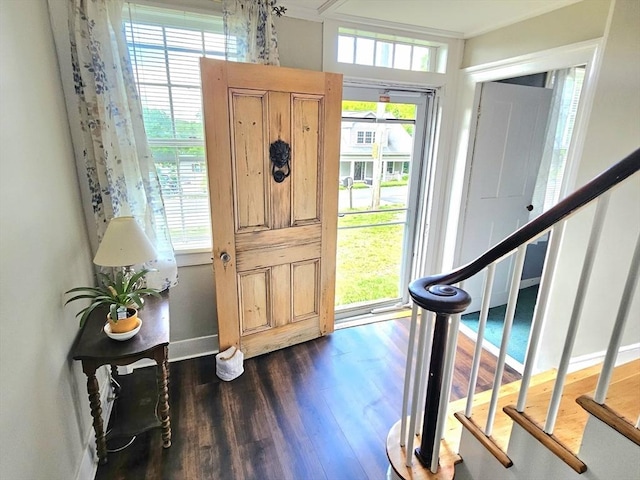 4 Randall Rd, Mattapoisett, MA 02739 - foyer entrance with dark wood-style floors, stairs, and baseboards