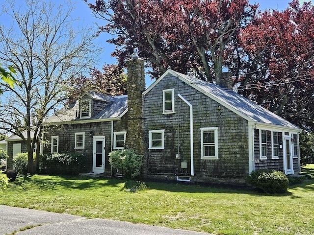 4 Randall Rd, Mattapoisett, MA 02739 - shingle-style home with a chimney and a front yard