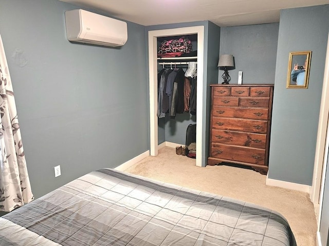 4 Randall Rd, Mattapoisett, MA 02739 - bedroom featuring a wall unit AC, carpet floors, a closet, and baseboards