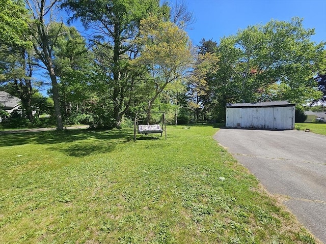 4 Randall Rd, Mattapoisett, MA 02739 - view of grassy yard featuring driveway