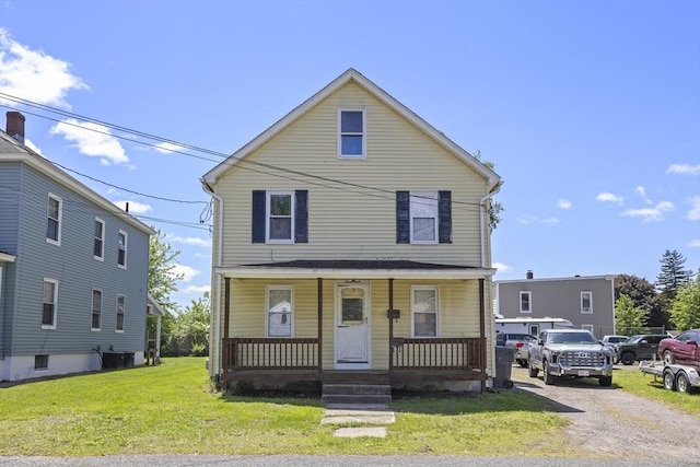 17 Westminster, Westfield, MA 01085 - traditional style home with covered porch, a front yard, and central AC unit
