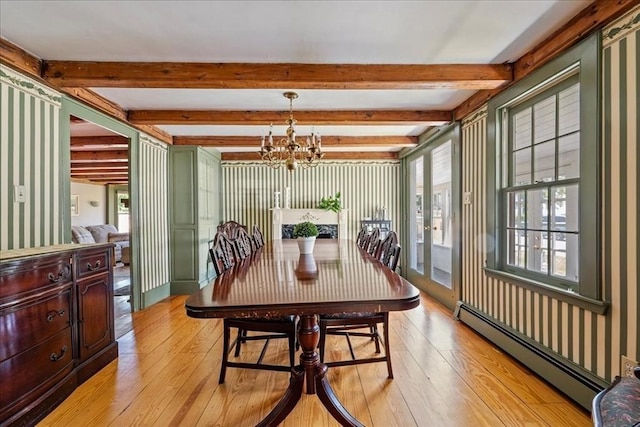 127 Main St, Norwell, MA 02061 - dining area with baseboard heating, a chandelier, light wood-style flooring, plenty of natural light, and beamed ceiling