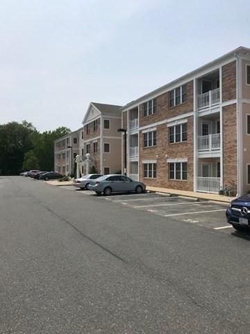1 Millbrook Ln Unit 201, Wakefield, MA 01880 - view of property with uncovered parking