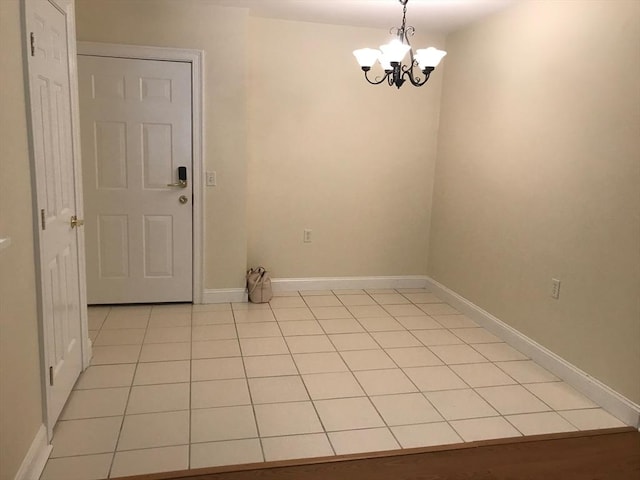 1 Millbrook Ln Unit 201, Wakefield, MA 01880 - unfurnished room with a chandelier and light tile patterned flooring