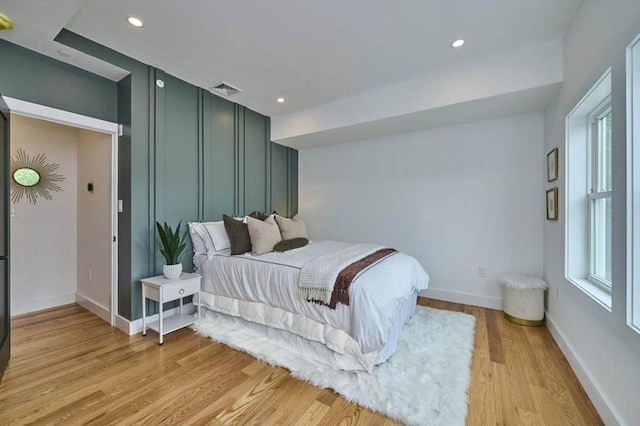18 Belknap St Unit 2, Arlington, MA 02474 - bedroom with light wood-style floors and recessed lighting
