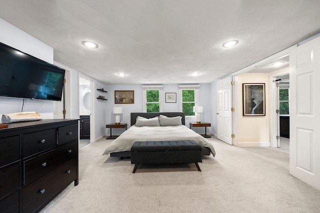 271 Haverhill St, North Reading, MA 01864 - bedroom featuring light colored carpet, baseboards, a textured ceiling, and recessed lighting