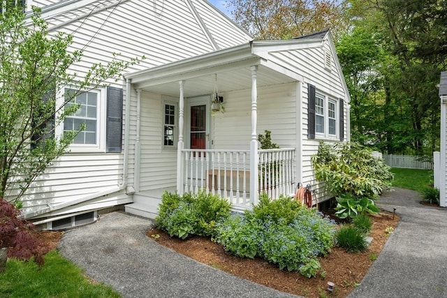 271 Haverhill St, North Reading, MA 01864 - entrance to property featuring covered porch and fence