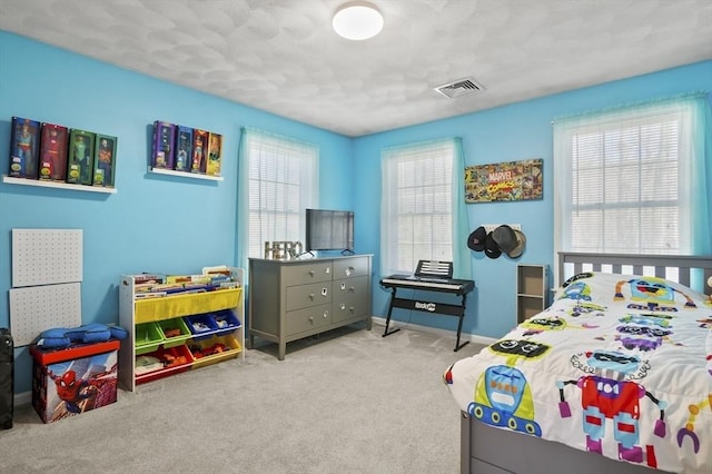 15 Whitewood Cir, Amesbury, MA 01913 - bedroom with visible vents, carpet flooring, and baseboards