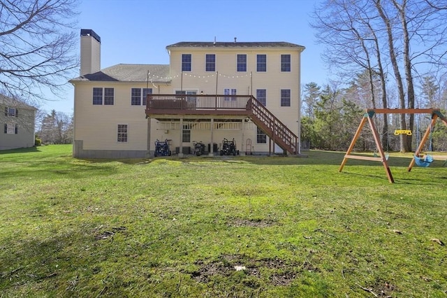 15 Whitewood Cir, Amesbury, MA 01913 - rear view of house with a yard, a chimney, stairway, and a deck