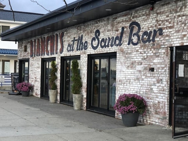 350 Revere Beach Blvd Unit 4P, Revere, MA 02151 - view of exterior entry featuring brick siding