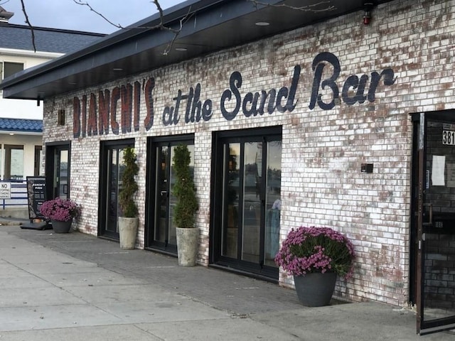 350 Revere Beach Blvd Unit 4P, Revere, MA 02151 - view of exterior entry with brick siding
