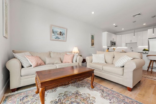 living room with light wood-type flooring