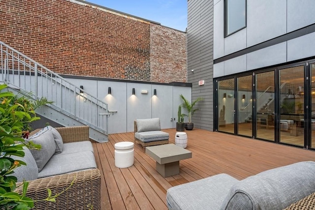 wooden deck with an outdoor hangout area