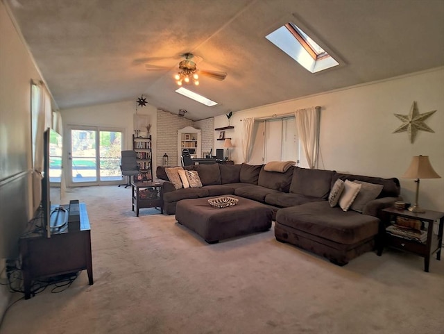 6 Cleveland Ave, Westfield, MA 01085 - living area with vaulted ceiling with skylight, a ceiling fan, and carpet flooring
