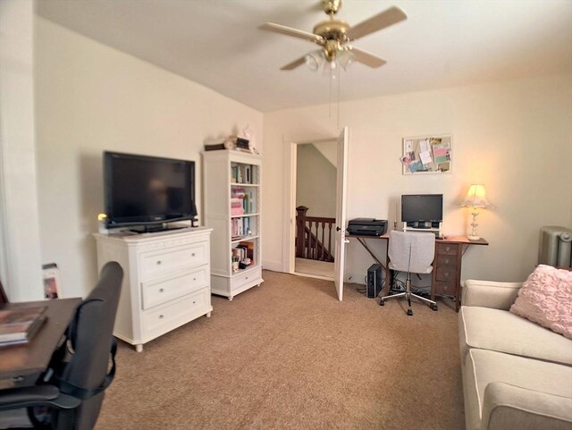 6 Cleveland Ave, Westfield, MA 01085 - carpeted home office with radiator and a ceiling fan