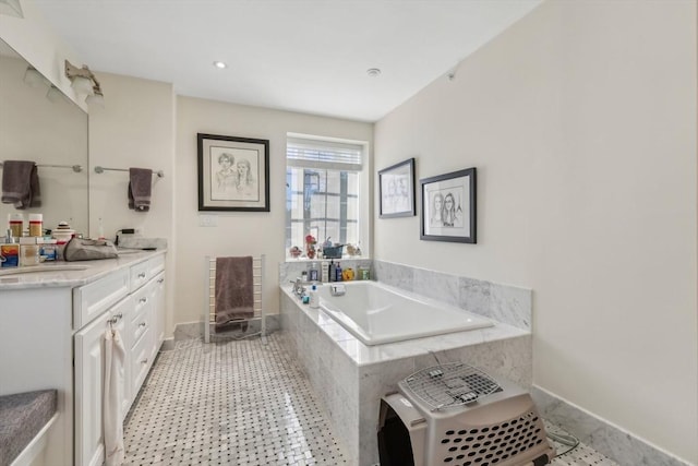 20 Chapel St Unit B811, Brookline, MA 02446 - full bath featuring a garden tub, vanity, and baseboards