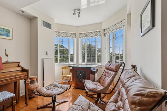20 Chapel St Unit B811, Brookline, MA 02446 - living area featuring wood finished floors and baseboards