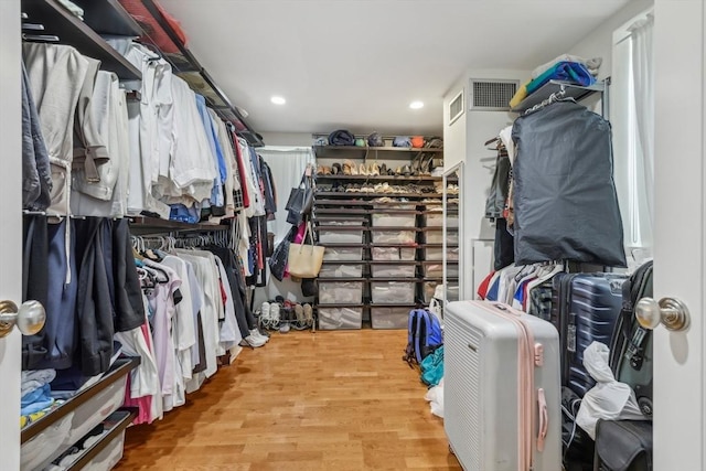 20 Chapel St Unit B811, Brookline, MA 02446 - walk in closet featuring wood finished floors