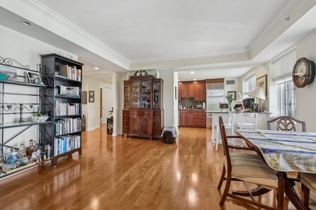20 Chapel St Unit B811, Brookline, MA 02446 - dining room featuring light wood-type flooring and ornamental molding