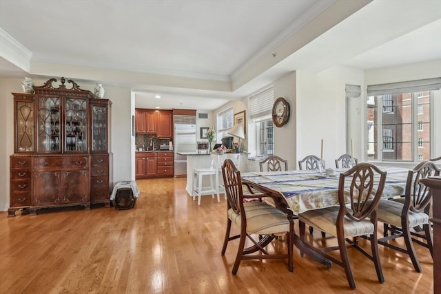20 Chapel St Unit B811, Brookline, MA 02446 - dining area with healthy amount of natural light, light wood finished floors, ornamental molding, and recessed lighting