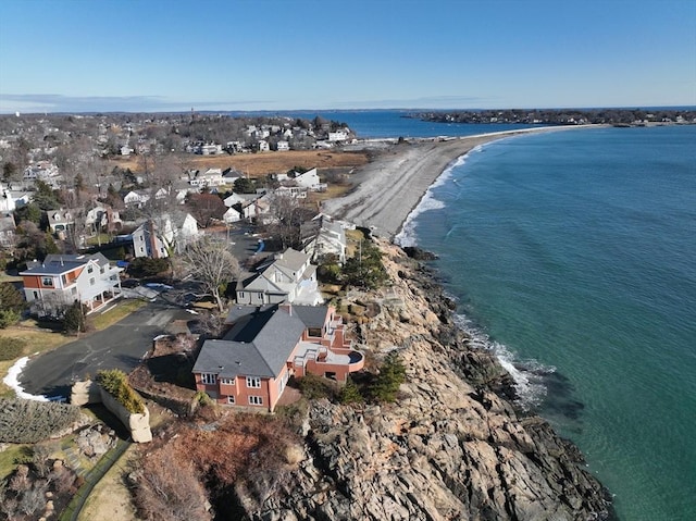 bird's eye view featuring a water view and a view of the beach