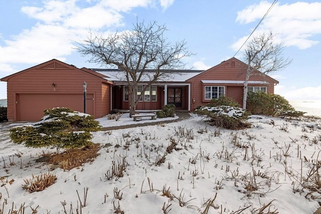 single story home featuring a garage