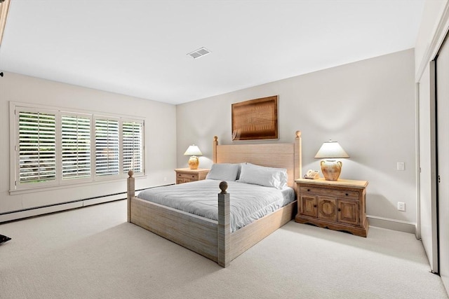 202 Allandale Rd Unit A, Boston, MA 02467 - bedroom with carpet, baseboard heating, a closet, and baseboards